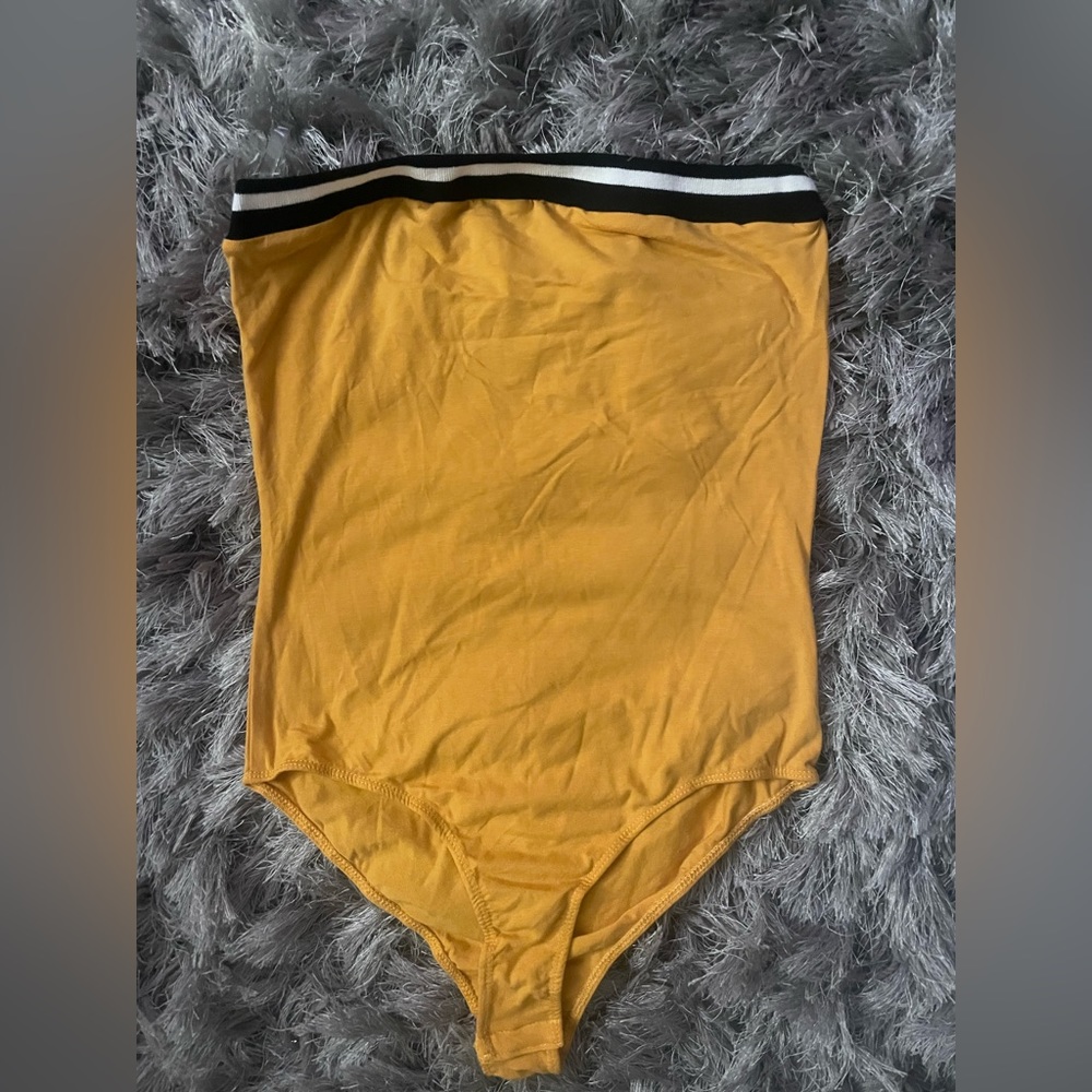 Yellow tube top style bodysuit. Size M